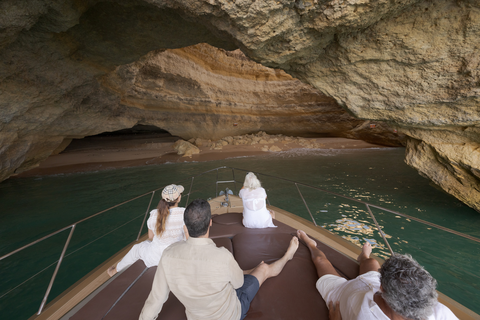 Atlantic Quest guests exploring the Benagil Caves by yacht